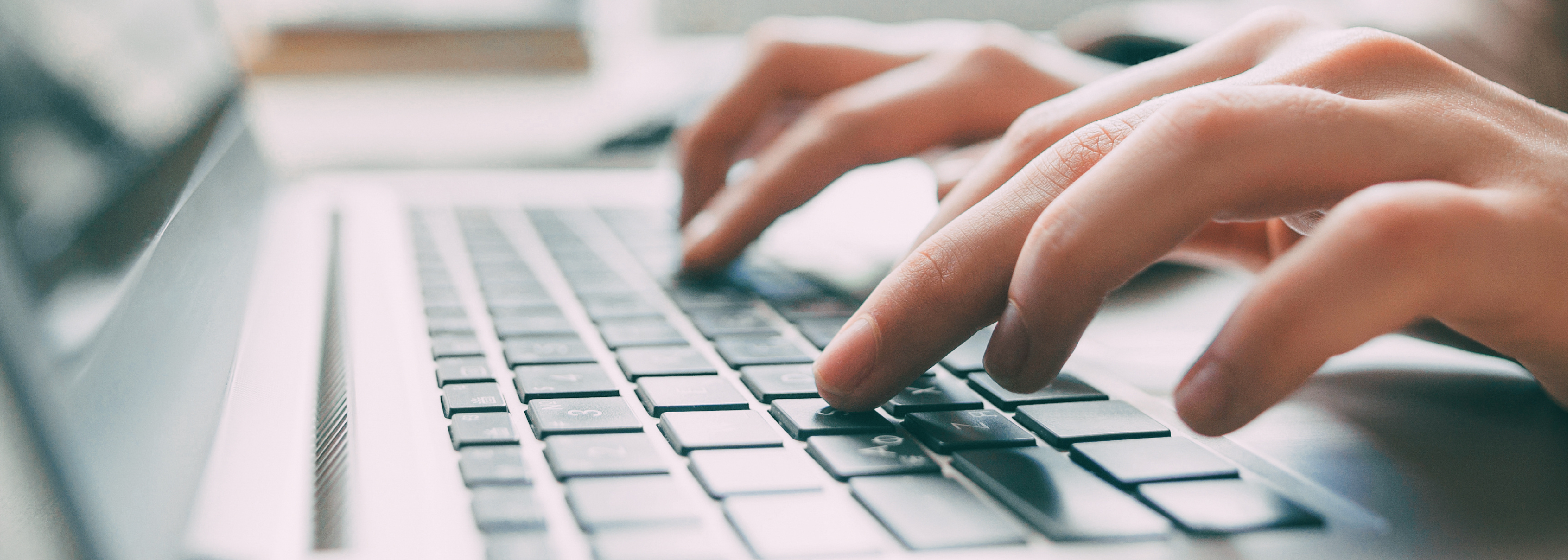 researching on a laptop